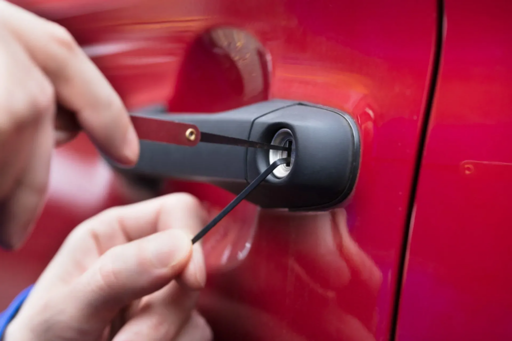 close up of lock-picking a car door