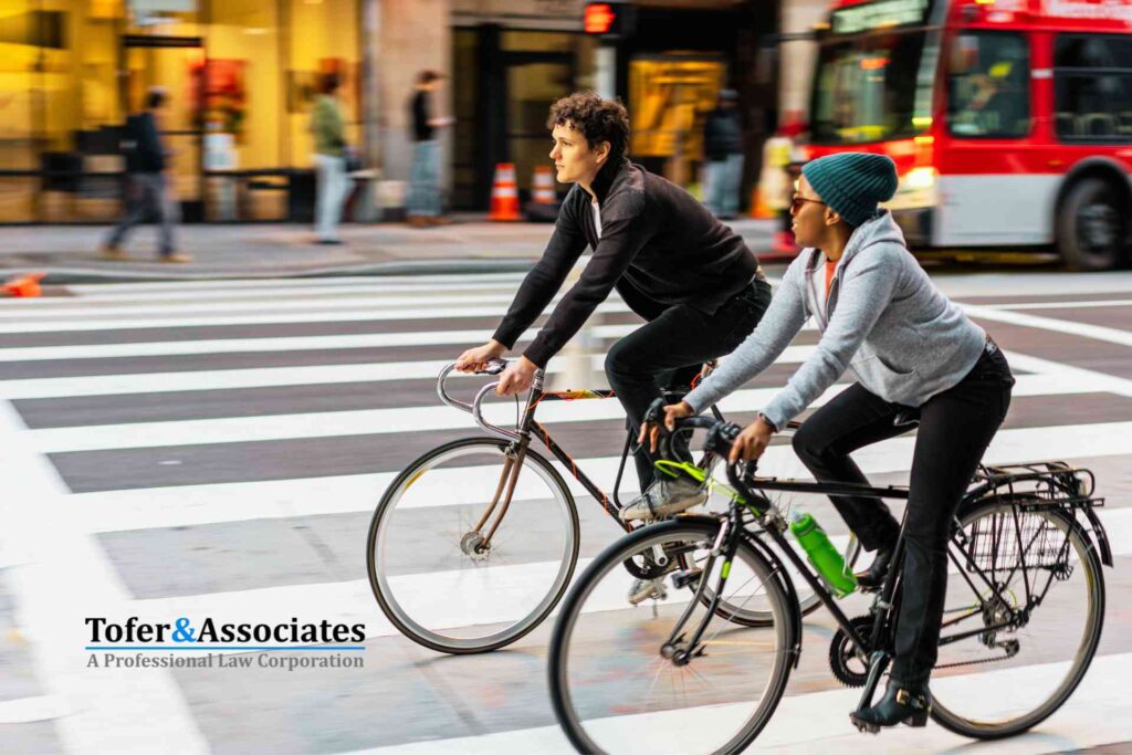 a couple of cyclists on Los Angeles roads