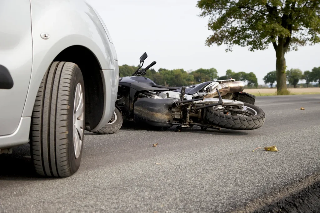 motorcycle crash on car
